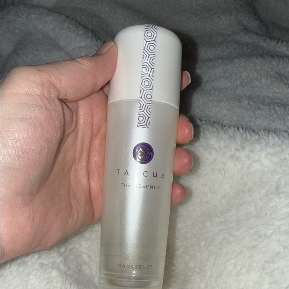 Tatcha The Essence in White and Purple